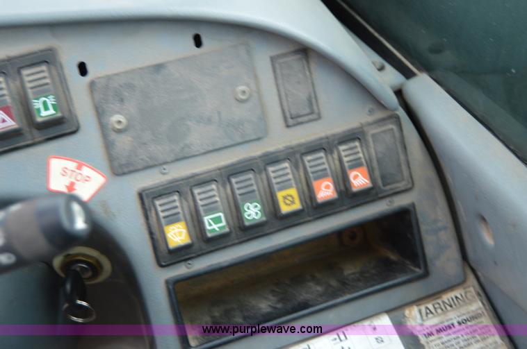 image for item F8334 2002 New Holland LM430 telehandler