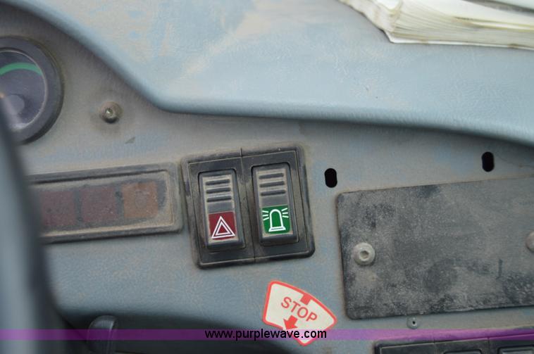 image for item F8334 2002 New Holland LM430 telehandler