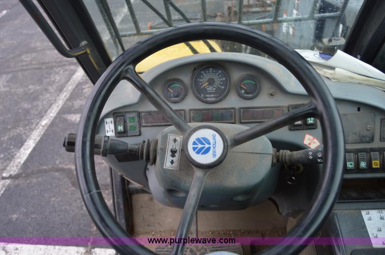 image for item F8334 2002 New Holland LM430 telehandler