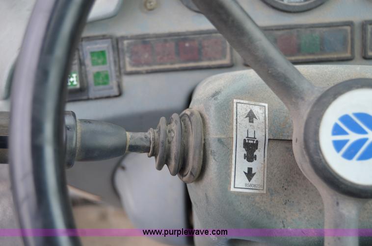 image for item F8334 2002 New Holland LM430 telehandler