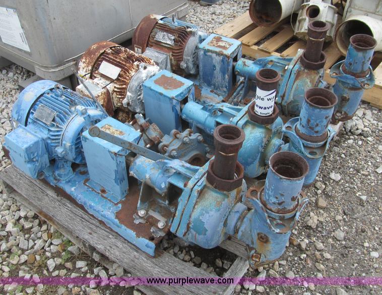 (3) Burks pumps in Russell, KS Item H8849 sold Purple Wave