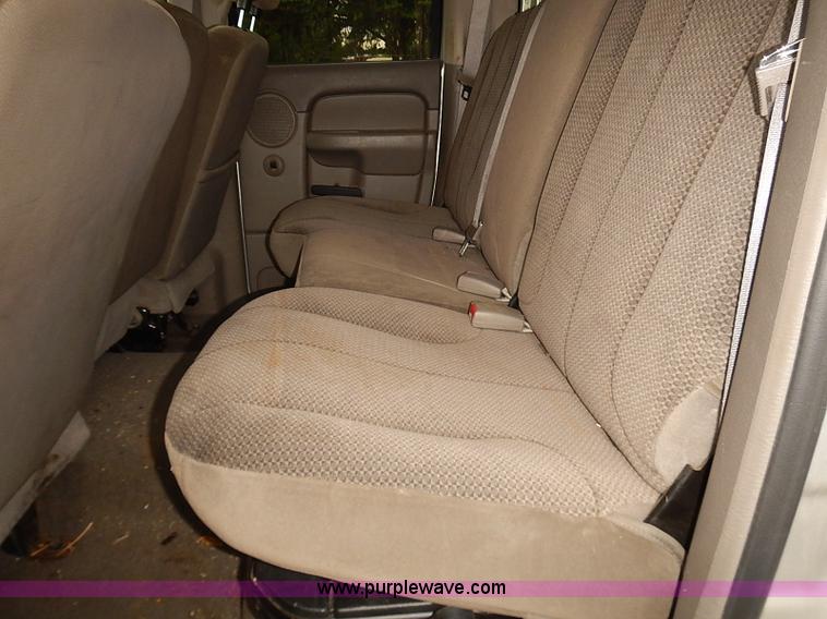 image for item I5493 2005 Dodge Ram 3500 Big Horn Edition Quad Cab flatbed truck