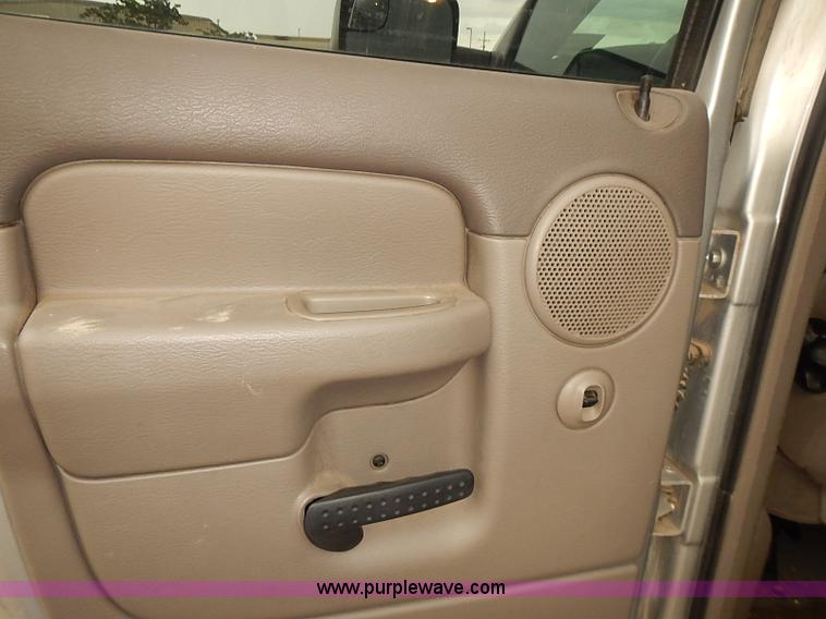 image for item I5493 2005 Dodge Ram 3500 Big Horn Edition Quad Cab flatbed truck