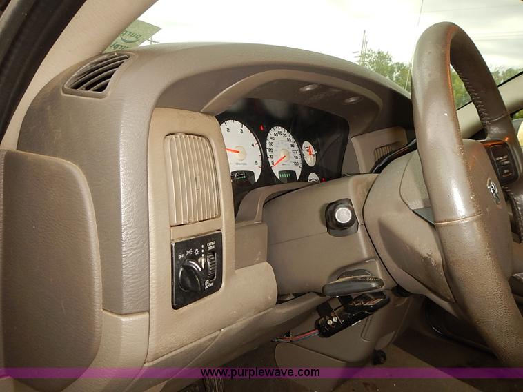 image for item I5493 2005 Dodge Ram 3500 Big Horn Edition Quad Cab flatbed truck