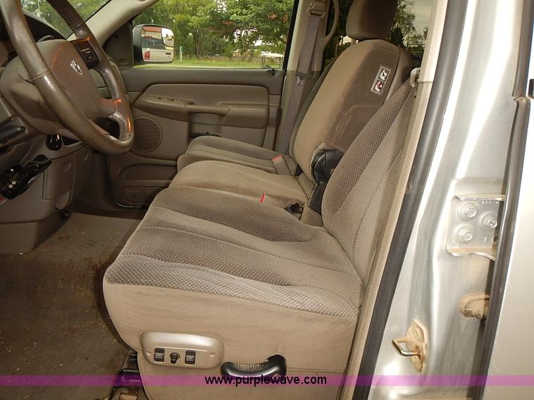 image for item I5493 2005 Dodge Ram 3500 Big Horn Edition Quad Cab flatbed truck