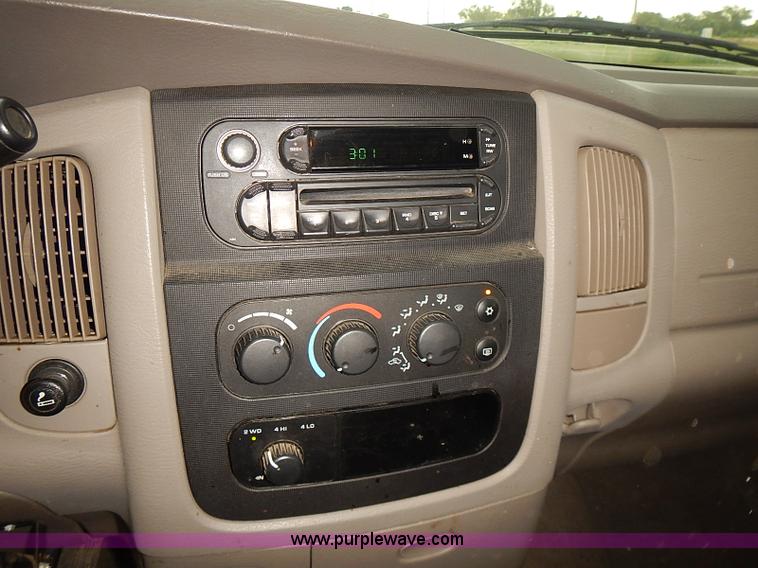 image for item I5493 2005 Dodge Ram 3500 Big Horn Edition Quad Cab flatbed truck