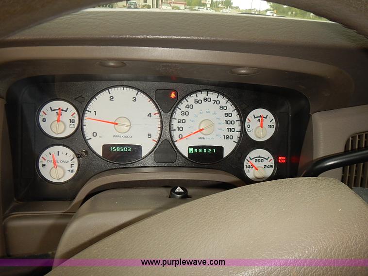 image for item I5493 2005 Dodge Ram 3500 Big Horn Edition Quad Cab flatbed truck