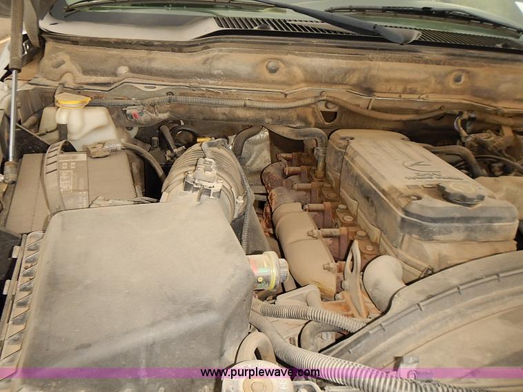 image for item I5493 2005 Dodge Ram 3500 Big Horn Edition Quad Cab flatbed truck