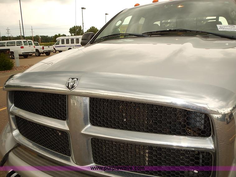 image for item I5493 2005 Dodge Ram 3500 Big Horn Edition Quad Cab flatbed truck