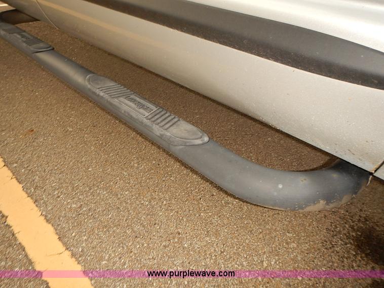 image for item I5493 2005 Dodge Ram 3500 Big Horn Edition Quad Cab flatbed truck