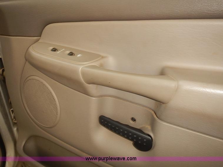 image for item I5493 2005 Dodge Ram 3500 Big Horn Edition Quad Cab flatbed truck