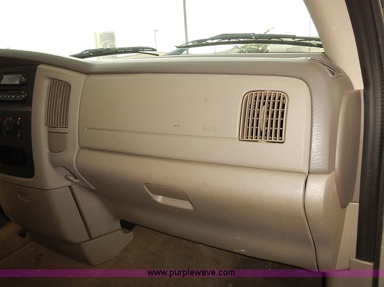 image for item I5493 2005 Dodge Ram 3500 Big Horn Edition Quad Cab flatbed truck