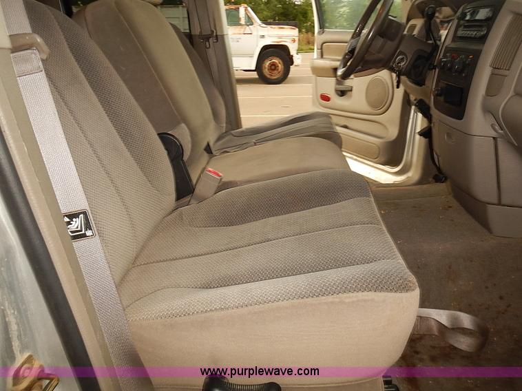 image for item I5493 2005 Dodge Ram 3500 Big Horn Edition Quad Cab flatbed truck