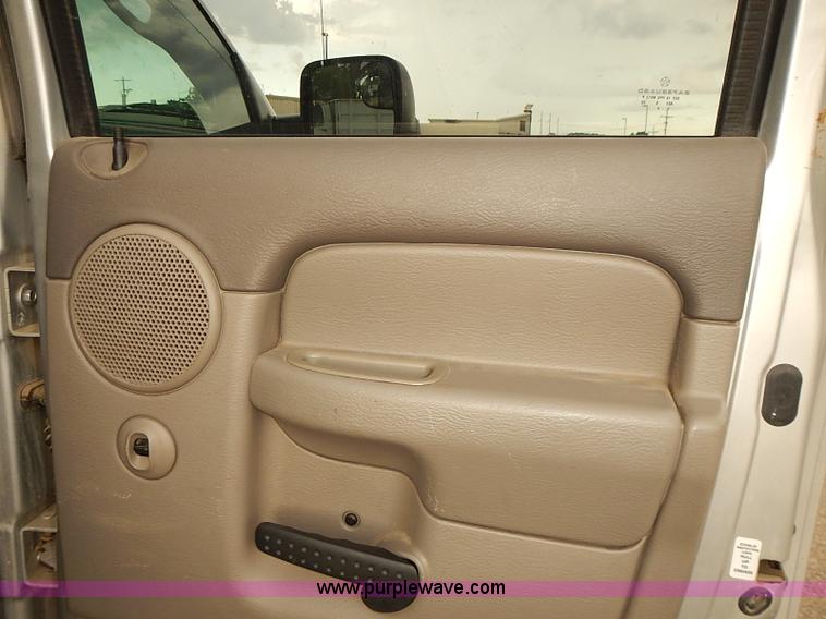 image for item I5493 2005 Dodge Ram 3500 Big Horn Edition Quad Cab flatbed truck