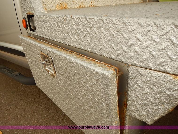 image for item I5493 2005 Dodge Ram 3500 Big Horn Edition Quad Cab flatbed truck