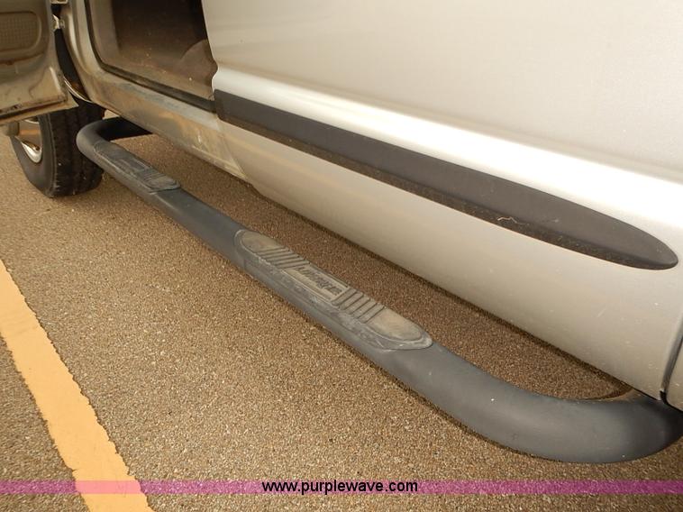 image for item I5493 2005 Dodge Ram 3500 Big Horn Edition Quad Cab flatbed truck