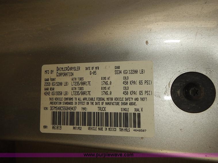 image for item I5493 2005 Dodge Ram 3500 Big Horn Edition Quad Cab flatbed truck