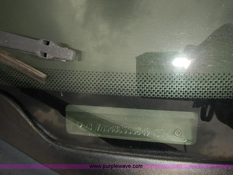 image for item I5493 2005 Dodge Ram 3500 Big Horn Edition Quad Cab flatbed truck