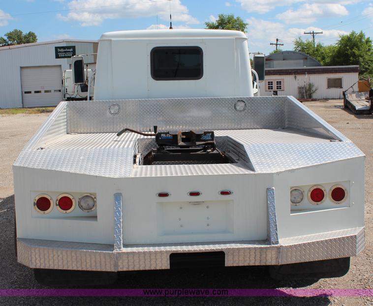 image for item J1141 2001 International 4700 Crew Cab flatbed truck