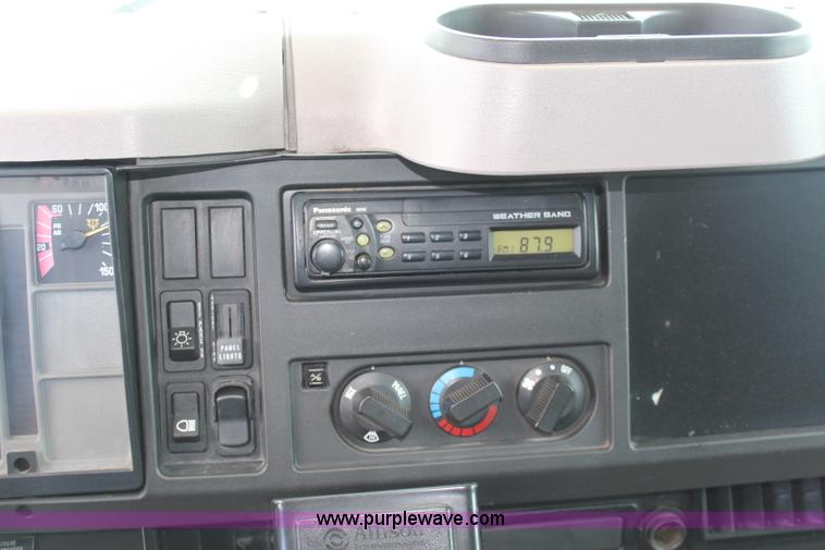 image for item J1141 2001 International 4700 Crew Cab flatbed truck