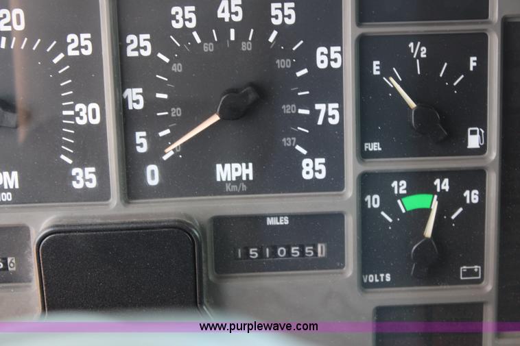 image for item J1141 2001 International 4700 Crew Cab flatbed truck