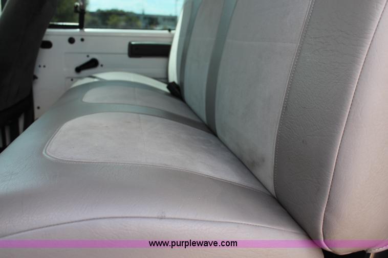 image for item J1141 2001 International 4700 Crew Cab flatbed truck