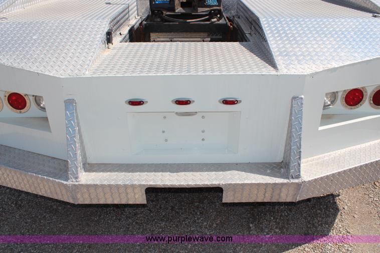 image for item J1141 2001 International 4700 Crew Cab flatbed truck