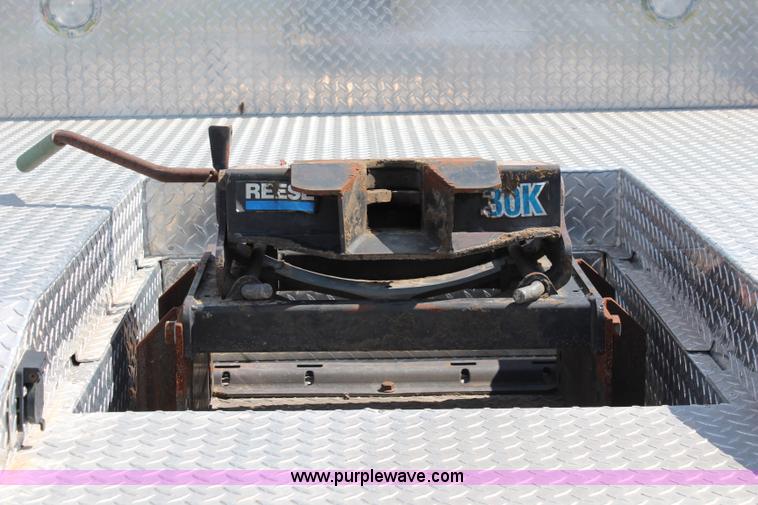 image for item J1141 2001 International 4700 Crew Cab flatbed truck