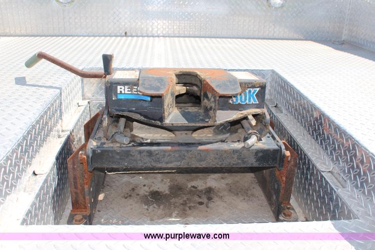 image for item J1141 2001 International 4700 Crew Cab flatbed truck