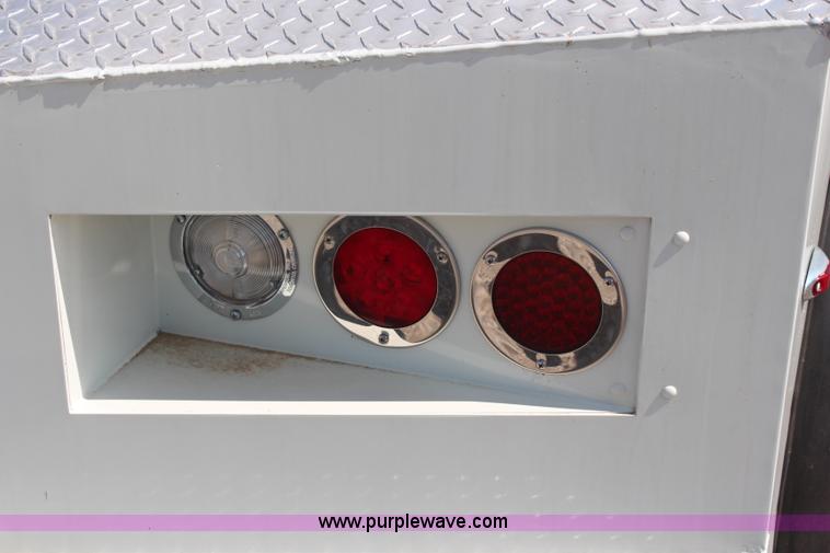 image for item J1141 2001 International 4700 Crew Cab flatbed truck