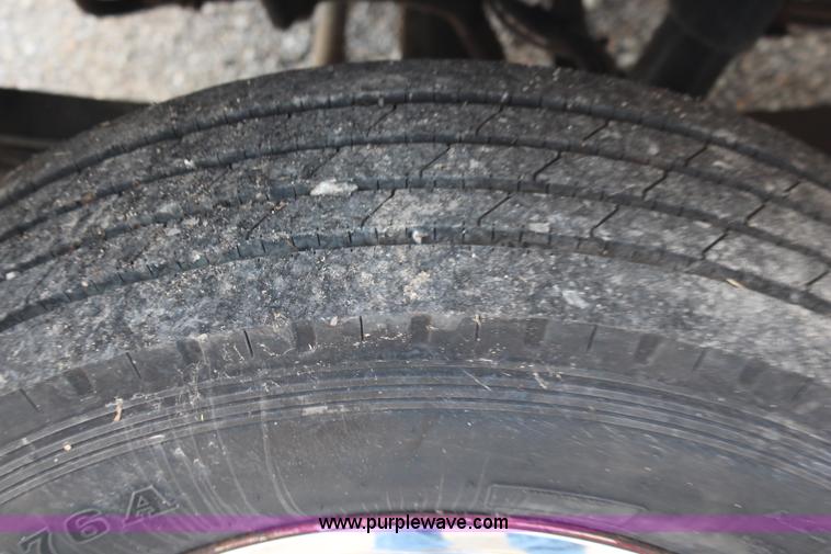 image for item J1141 2001 International 4700 Crew Cab flatbed truck