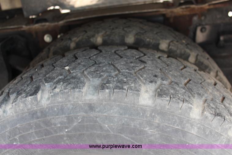 image for item J1141 2001 International 4700 Crew Cab flatbed truck