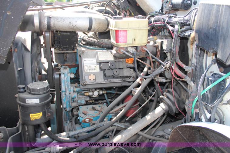 image for item J1141 2001 International 4700 Crew Cab flatbed truck