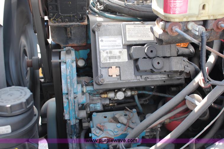 image for item J1141 2001 International 4700 Crew Cab flatbed truck