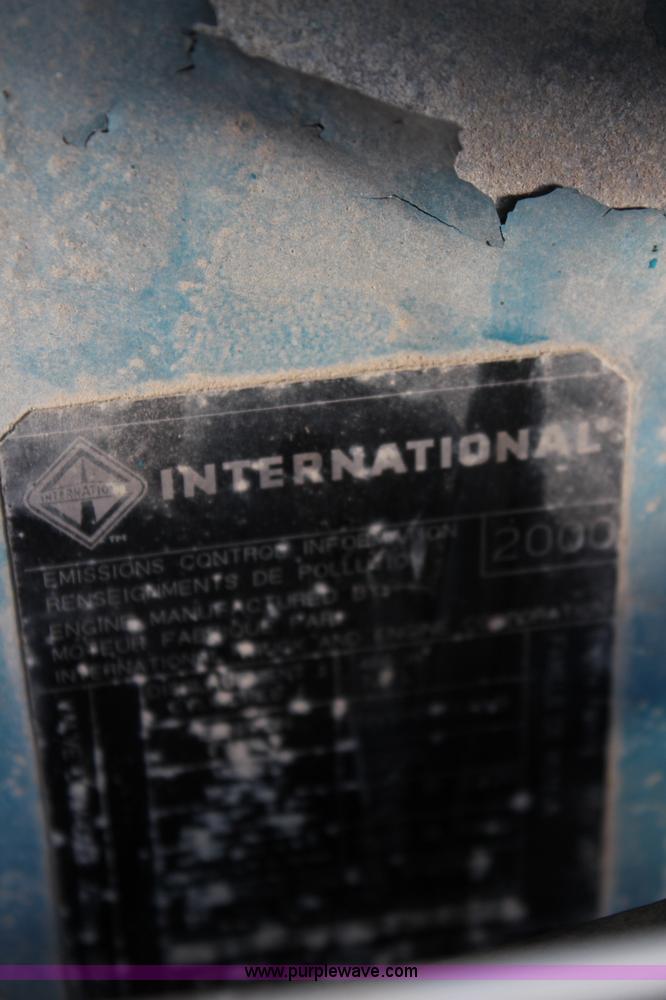 image for item J1141 2001 International 4700 Crew Cab flatbed truck