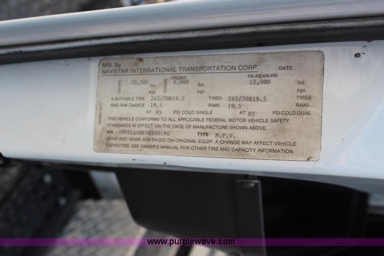 image for item J1141 2001 International 4700 Crew Cab flatbed truck