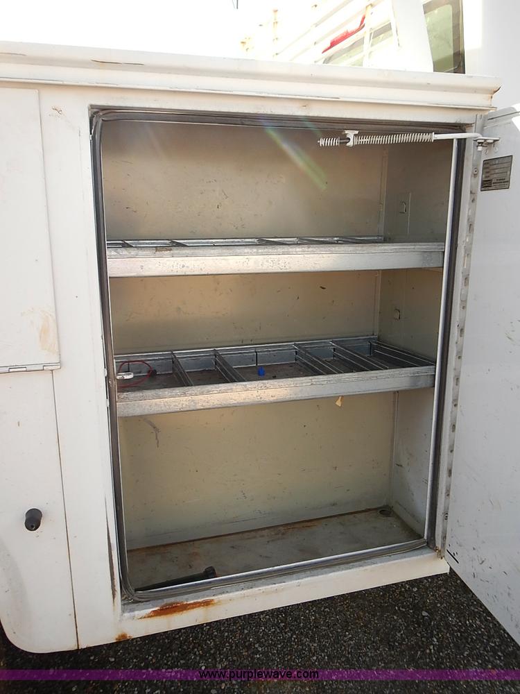 image for item E7762 2005 Chevrolet Silverado 2500HD Ext. Cab utility truck