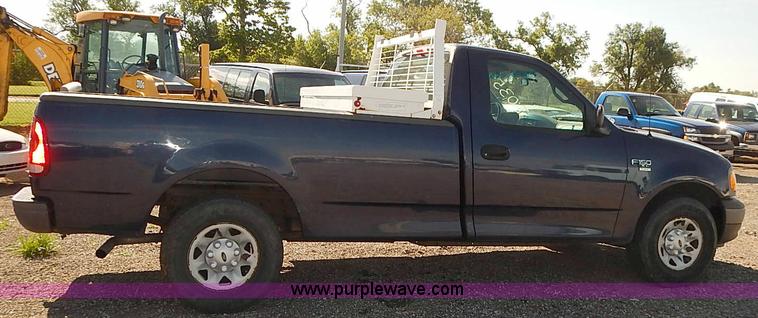 image for item E7765 2002 Ford F150 XL pickup truck
