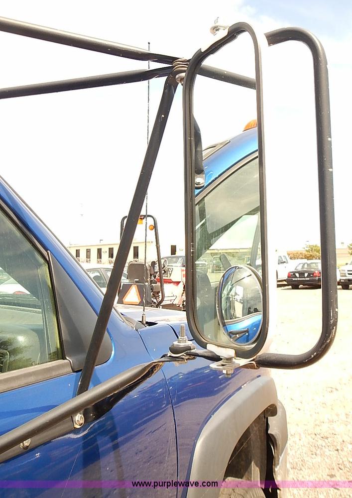 image for item E7779 2003 Chevrolet Silverado 3500 stake body flatbed truck with crane