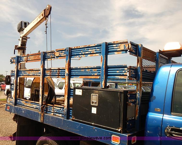 image for item E7779 2003 Chevrolet Silverado 3500 stake body flatbed truck with crane