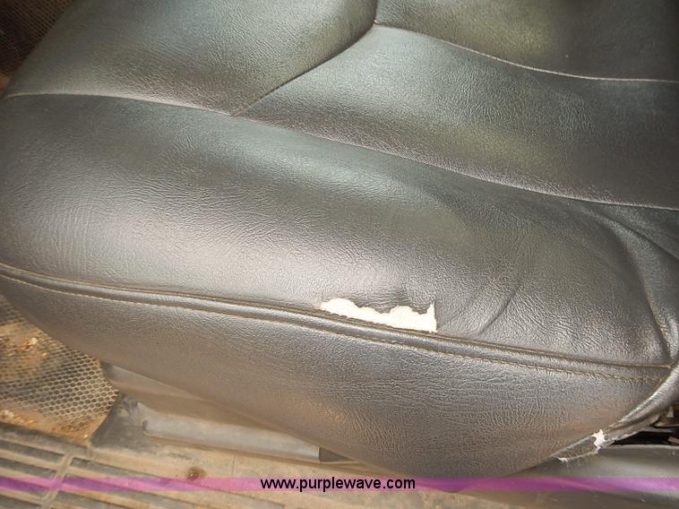 image for item E7779 2003 Chevrolet Silverado 3500 stake body flatbed truck with crane