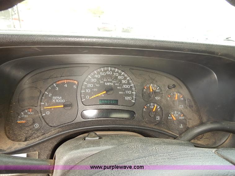 image for item E7779 2003 Chevrolet Silverado 3500 stake body flatbed truck with crane