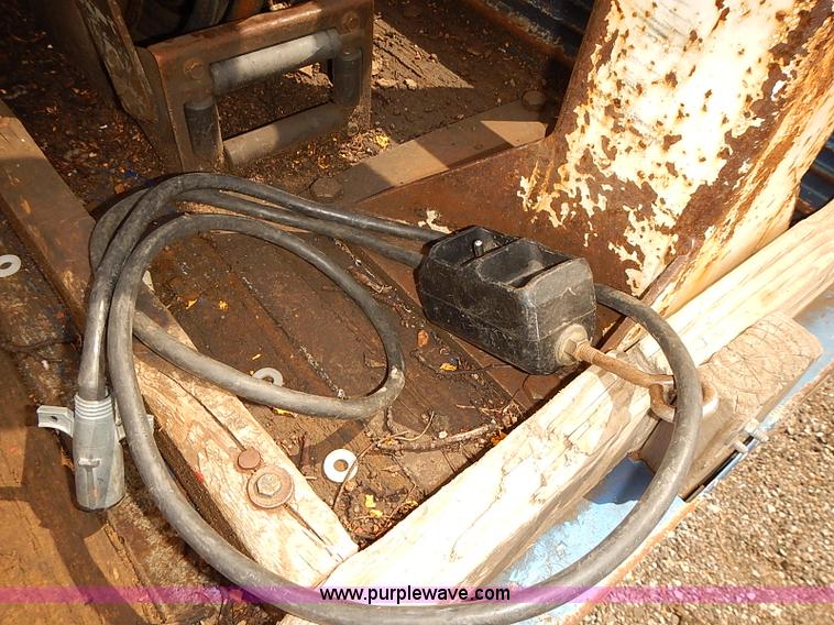 image for item E7779 2003 Chevrolet Silverado 3500 stake body flatbed truck with crane