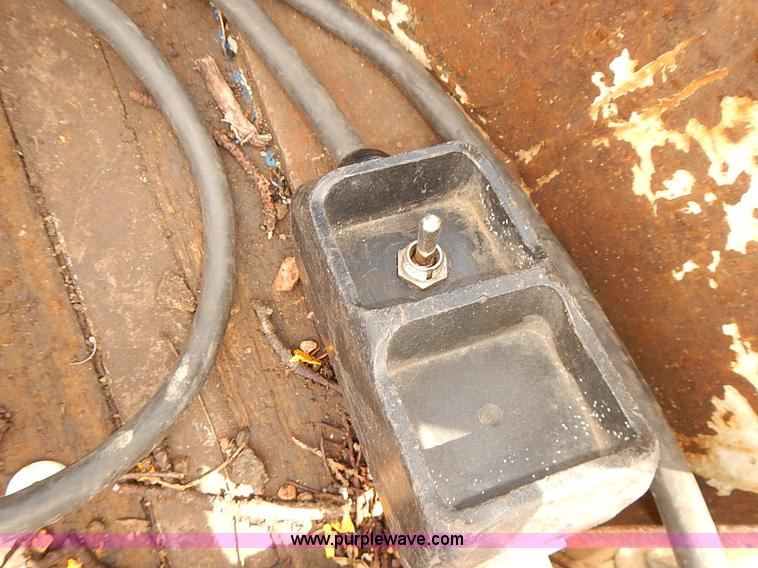 image for item E7779 2003 Chevrolet Silverado 3500 stake body flatbed truck with crane