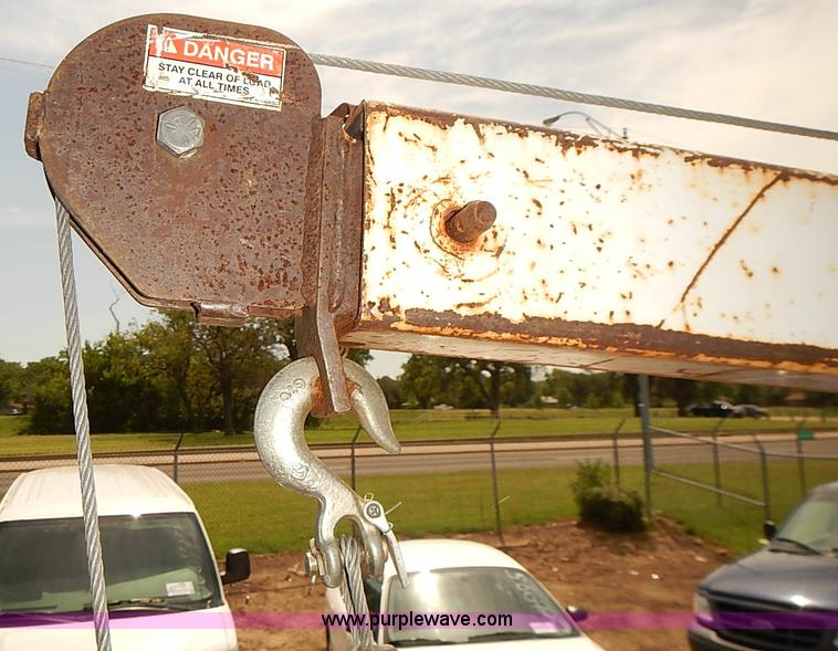 image for item E7779 2003 Chevrolet Silverado 3500 stake body flatbed truck with crane