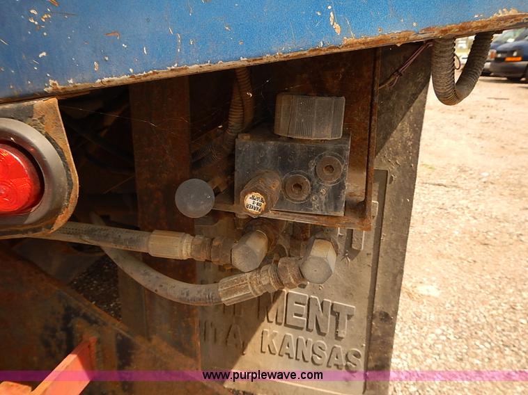 image for item E7779 2003 Chevrolet Silverado 3500 stake body flatbed truck with crane