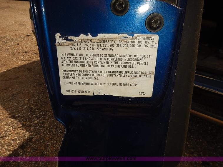 image for item E7779 2003 Chevrolet Silverado 3500 stake body flatbed truck with crane