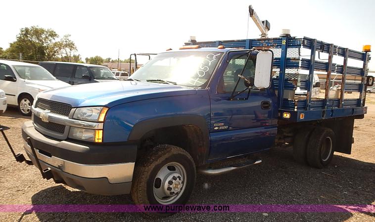image for item E7800 2003 Chevrolet Silverado 3500 flatbed stake side truck