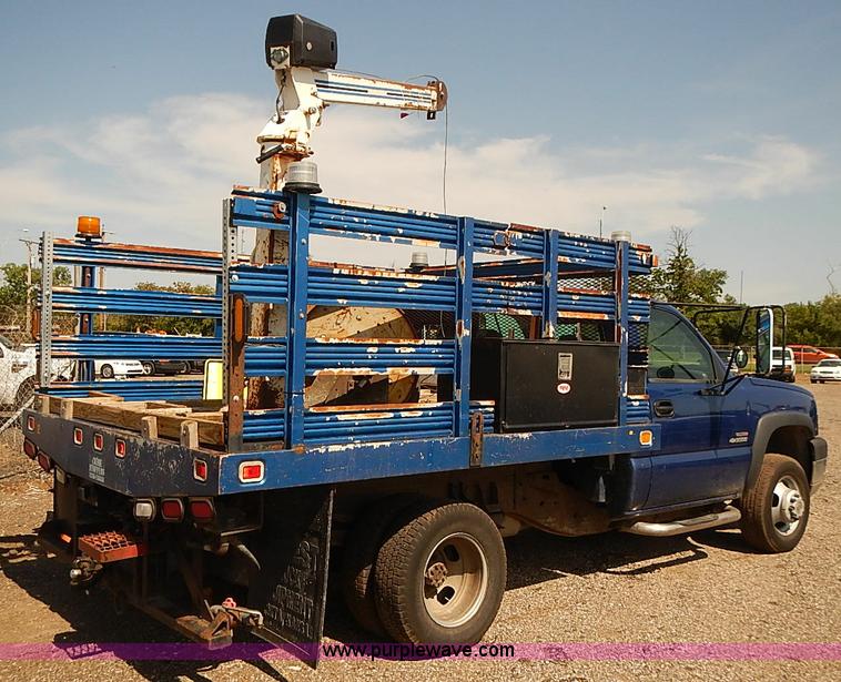 image for item E7800 2003 Chevrolet Silverado 3500 flatbed stake side truck