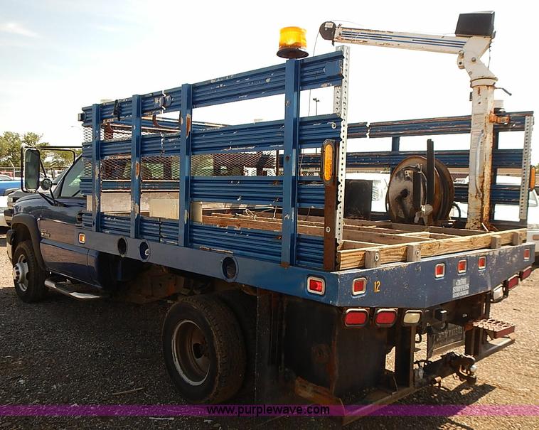 image for item E7800 2003 Chevrolet Silverado 3500 flatbed stake side truck